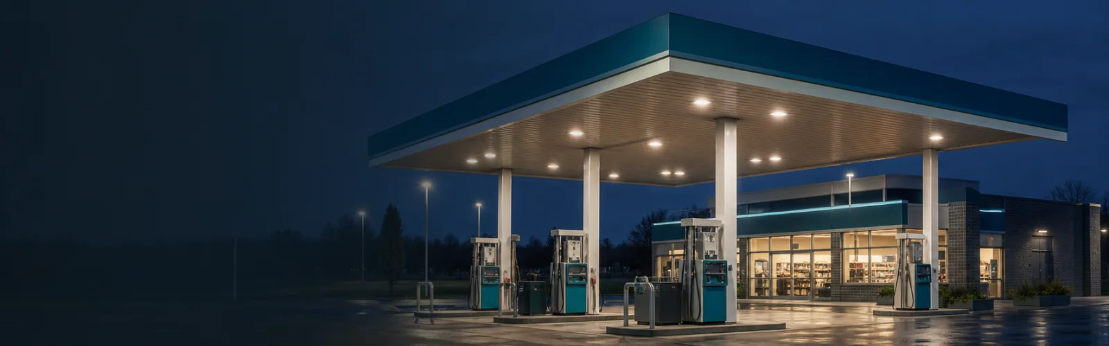 Modern fuel station and retail shop at blue hour